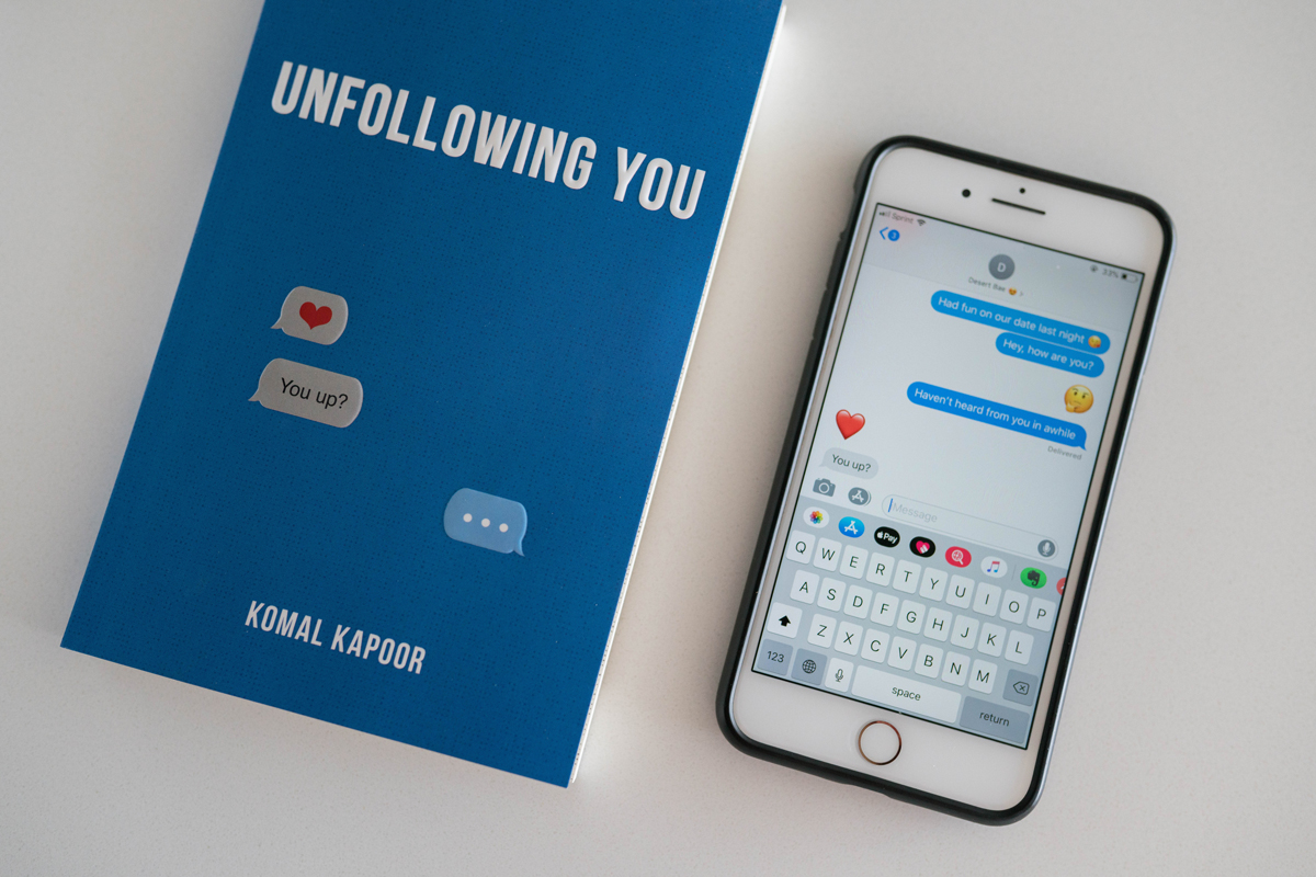 Unfollowing You book and cell phone