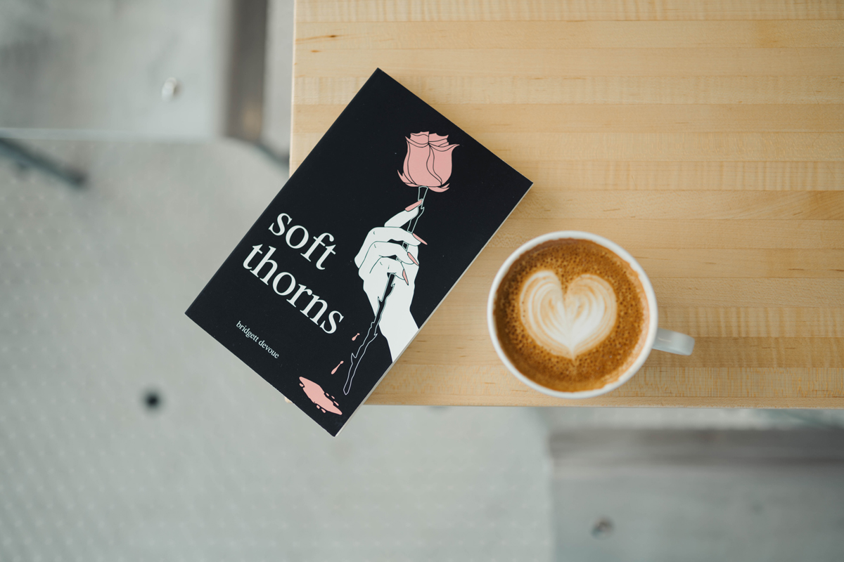 soft thorns book cover and coffee cup