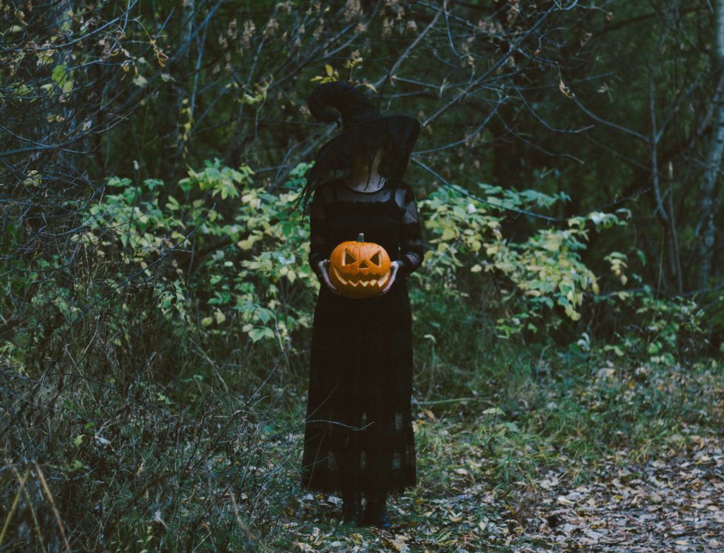 person in witch costume