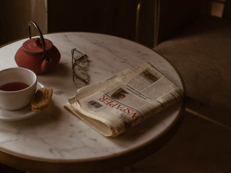 newspaper on coffee table