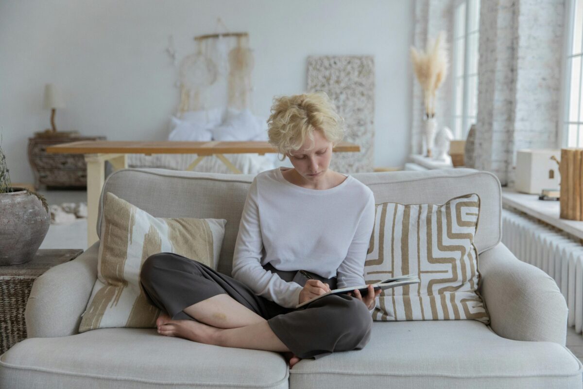 person reading on a couch